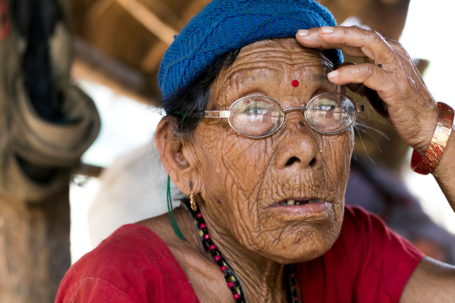 Mihaq Myahq Kusunda elder portrait showing layered identity as forest king Ban Raja in Nepal Himalayan foothills